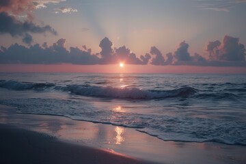 Wall Mural - A serene moment with a beautiful sunset over the ocean on the beach