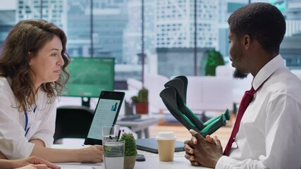 Wall Mural - HR recruiters team interviewing a candidate with crutches in office, asking him about qualifications and business administration studies. Employment staff talk with a job applicant. Camera A.