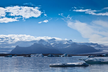 Majestic snow mountains at the South Pole, showcasing the stark beauty of the icy terrain found at the North Pole.