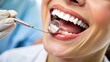 © Владлена Демидова - Dental Examination with Mirror on Smiling Patient's Teeth.