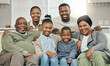 © Flashizzle/peopleimages.com - African, portrait and smile with big family on sofa in living room of home together for bonding. Happy, love or visit with generations of senior people, parents and children in apartment for wellness