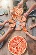 © DavisShared/peopleimages.com - Above, hands and family outside for pizza lunch for happiness, bonding and visit with excited guest. People, home and outdoor table with food or meal, carbs and fun on holiday with nutrition