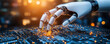© BOW_NAPASORN - A robot hand is touching a computer chip. Concept of technology and innovation, as well as the idea of human-like machines interacting with the digital world