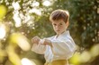 © LimeSky - Young boy in karate outfit training outdoors Martial arts practice for children Karate kid in park