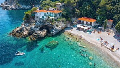 Sticker - Aerial View of a Secluded Beach with Houses and Clear Turquoise Water