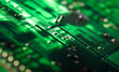 © Henk Vrieselaar - Illuminated green electronic circuit board with many electrical components. Narrow depth of field