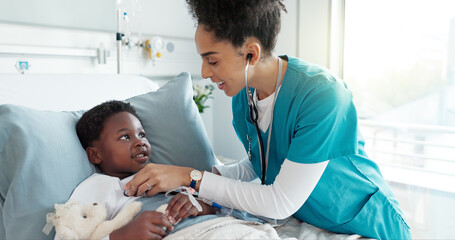 Patient, doctor and girl with checkup, kid and healthcare with wellness, talking and service. Medical, professional and child in hospital bed, appointment and recovery with healing or treatment