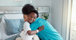 © PeakPoints/peopleimages.com - Nurse, kid and patient on hug with smile at hospital for test results, good news and feedback. People, happy and satisfied with recovery on illness or disease with care, support and love in bed