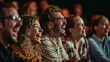© kimly - A group of people attending a live comedy show and laughing at the performance.