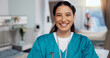 © PeakPoints/peopleimages.com - Doctor, portrait and smile in hospital for healthcare, confidence and professional. Medical assistant, happy and trust in gynecology clinic for wellness, medicine and government services in Brazil