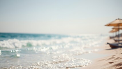 Wall Mural - Gentle waves lap on the sandy shore under bright sunlight at a tropical beach