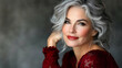 © Siasart Stock - Portrait of a beautiful woman with grey hair and red lipstick smiling.