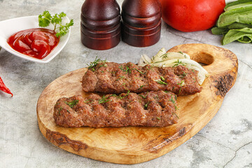 Canvas Print - Kebab with beef served onion