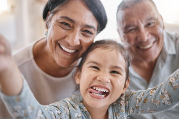 Wall Mural - Selfie, funny and portrait of kid with grandparents in home for memory, bonding or family time. Smile, love and face of girl child with grandmother and grandfather for photography picture in house.