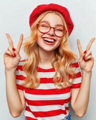 Sticker - Happy young woman in red beret and glasses showing peace signs. AI.