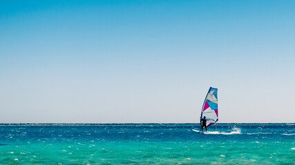 Poster - one surfer rides in the Red Sea in Egyp