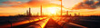 © Weerapat - Industrial pipelines under a stunning sunset, showcasing energy production and the beauty of technology in nature.