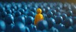 © MochSjamsul - Yellow wodden figure stand out among blue crowd, concept of finding the right person