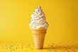 © adobestocker1 - A white ice cream cone with rainbow sprinkles on top