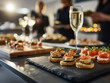 © zphoto83 - Elegant appetizers paired with champagne at a sophisticated evening gathering