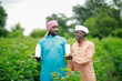 © SDV Ads - happy two Indian farmer standing in farm
