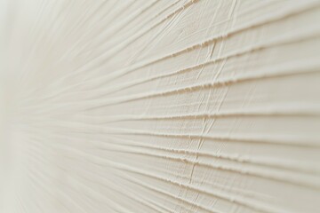 Sticker - The image is a close up of a white wall with a patterned texture