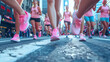 © Creative Valley - Group of young women running in breast cancer awareness marathon