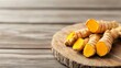 © Photography09 - Bright yellow turmeric root on a rustic wooden board, turmeric superfood, natural anti-inflammatory properties