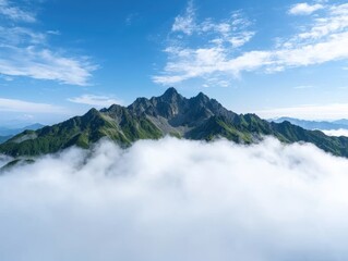 Wall Mural - Majestic mountain peaks piercing through the clouds