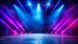 © mamo studios - A stage illuminated with vibrant purple and blue lights, creating a dynamic and energetic atmosphere for the performance