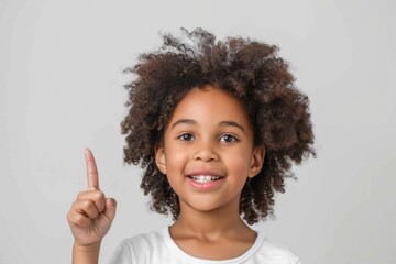 Poster - A young child holds a toothbrush, ready to brush teeth