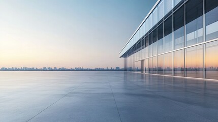 Wall Mural - Empty rooftop with cityscape reflection on glass building at sunrise.