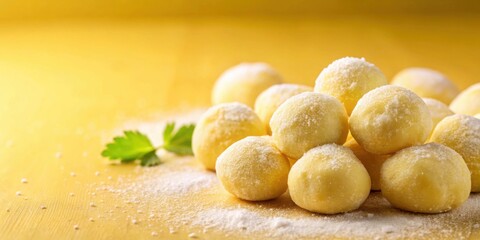 Raw potato dumplings on yellow background. Selective focus, potato, dumplings, raw, food, cooking, traditional, homemade