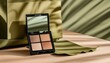 © Png - Video - Photo - Luxurious makeup palette, featuring warm tones, soft reflections, stylish black casing, surrounded by elegant green and beige textures, ideal for enhancing natural beauty.
