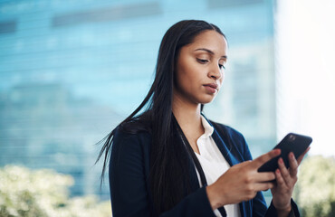 Fototapete - Woman, smartphone and notification in city for business, networking and app for directions. Technology, corporate female person and online in street for connectivity, walking and travel or commute