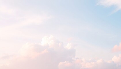 Poster - Soft pink and blue clouds in a light sky.