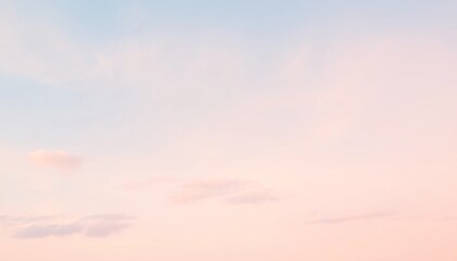 Poster - Soft pink and blue clouds in a pastel sky.