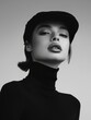 © Наталья Добровольска - Monochrome portrait of a model in a black turtleneck, face covered by a stylish hat.