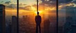 © hassan - Businessman in office, sunset cityscape through window, panoramic view, business theme.