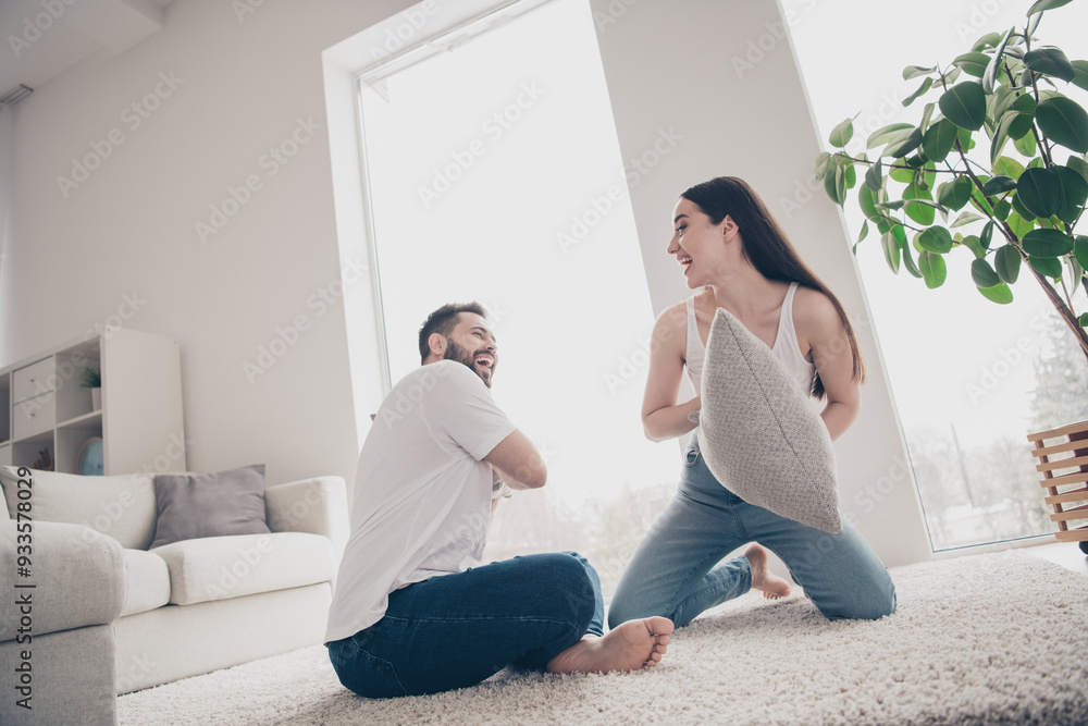 Photo of adorable sweet couple wear casual shirts enjoying weekend having fun together indoors room home house