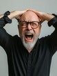 © Tatiana - A man with a beard and glasses is screaming