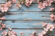 © Davy - rustic wooden background framed by a border of soft pink flowers