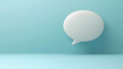 Wall Mural - a white speech bubble on a light blue background, representing communication and dialogue.