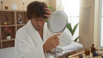 Poster - Young man in a spa salon wellness center examining his hair in a mirror, surrounded by indoor beauty and relaxation elements.