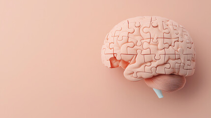 A detailed puzzle brain illustration on a soft pink background, symbolizing mental health and cognitive function.