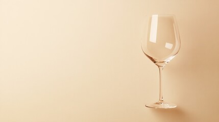 Canvas Print - Empty Wine Glass On A Beige Background