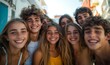 © Kishan - Big group of friends taking selfie picture smiling at camera - Laughing young people celebrating standing outside and having fun - Portrait photography of teens guys and girls enjoying, Generative AI