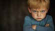 © Lamina - young child with arms crossed, a pouty face, and eyes glaring, expressing their displeasure with an adorable but intense scowl