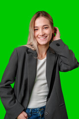 Sticker - Woman Smiling In A Black Blazer Against A Green Screen