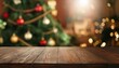 © Marko - Empty wooden table over defocused christmas background with copy space